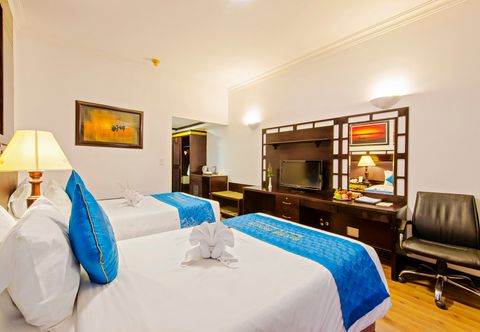 Phòng ngủ Hoi An River Beach Resort and Residences