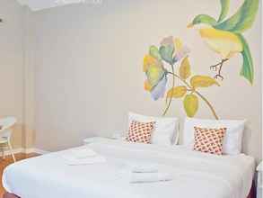 Kamar Tidur 4 The Color Ville Hotel