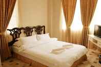 Bedroom The Naga Manor Hotel