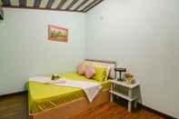 Kamar Tidur Sixty Courtyard Homestay