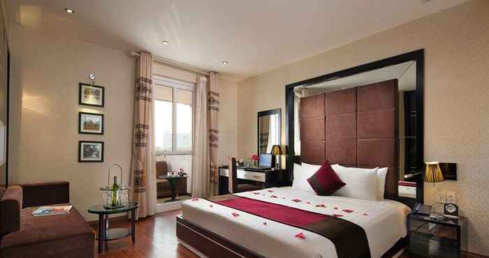 Kamar Tidur Silk Central Hotel & Travel