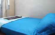 Bedroom 6 Comfort Room Syariah near UMS at Wisma Brilian 3