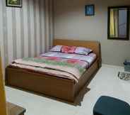 Bedroom 4 Cozy Room Syariah near UMS at Wisma Salsabilla