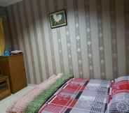Bedroom 6 Cozy Room Syariah near UMS at Wisma Salsabilla