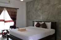 ห้องนอน Resort at Lampang