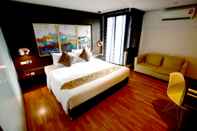 Bedroom i Residence Hotel Silom