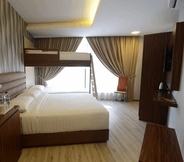 Phòng ngủ 6 Hotel Zamburger Zamsaham