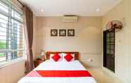 Kamar Tidur 5 Oasis Riverside Hotel