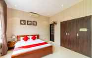 Kamar Tidur 6 Oasis Riverside Hotel