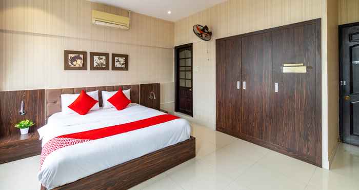 Kamar Tidur Oasis Riverside Hotel