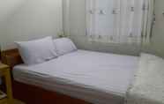 Kamar Tidur 3 Tha Rue Guesthouse 