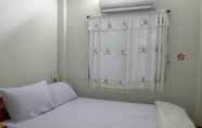 Kamar Tidur 6 Tha Rue Guesthouse 