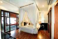 Bedroom Pao Jin Poon Beach Front Villa