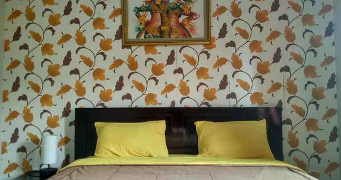Bedroom Cozy Rooms near Jalan Kaliurang at Guest House Arjuna Syariah