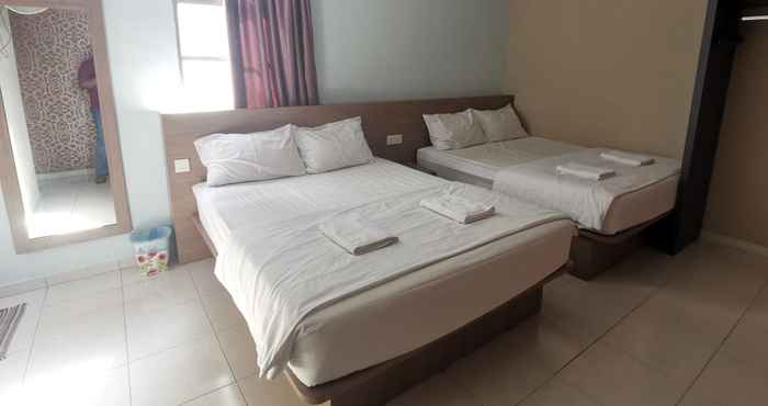 Kamar Tidur Super OYO 89930 Golden Guest House