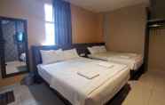 Kamar Tidur 3 Super OYO 89930 Golden Guest House