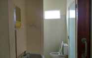 In-room Bathroom 7 Value Room in Seturan at Aquilas