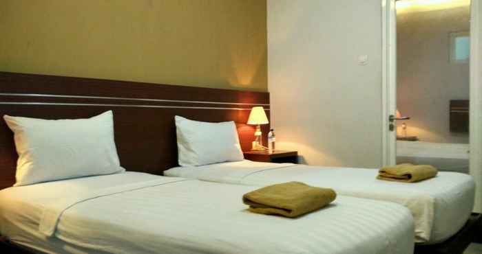 ห้องนอน Bale Rama Hotel