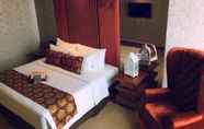 Kamar Tidur 5 Cinnamon Hotel Boutique Syariah