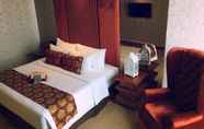 Bedroom 5 Cinnamon Hotel Boutique Syariah