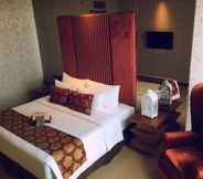 Bedroom 5 Cinnamon Hotel Boutique Syariah