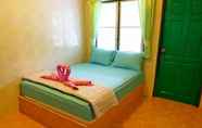 Kamar Tidur 5 Pop Riverside Homestay