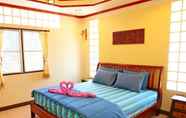 Kamar Tidur 4 Pop Riverside Homestay