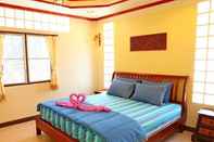 Kamar Tidur Pop Riverside Homestay