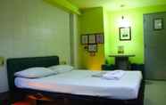 Kamar Tidur 6 Orchids Drive Inn Hotel and Restaurant