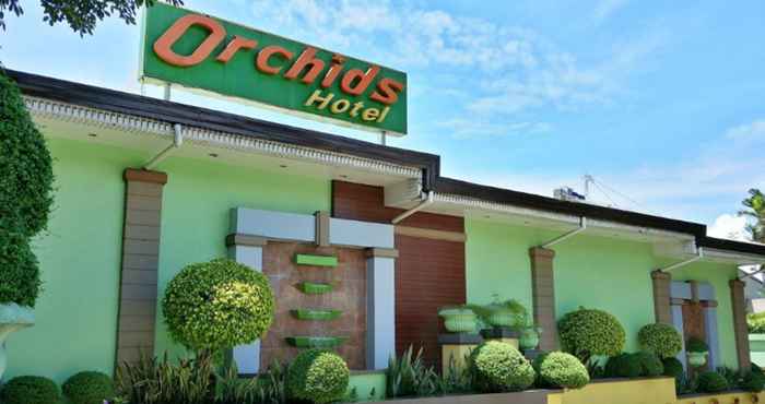 Bangunan Orchids Drive Inn Hotel and Restaurant