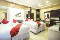 Bedroom Excella Hotel