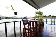 ห้องนอน The Best Riverside Guesthouse