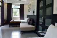 Kamar Tidur One Crescent Place Hotel