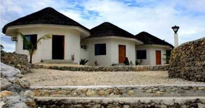 Luar Bangunan John Lhea Beach Cottages