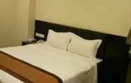 Kamar Tidur 7 The Corum View Hotel