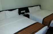 Kamar Tidur 6 The Corum View Hotel