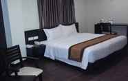 Kamar Tidur 5 The Corum View Hotel