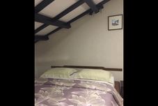 寝室 Palm Mansion Boutique Suites