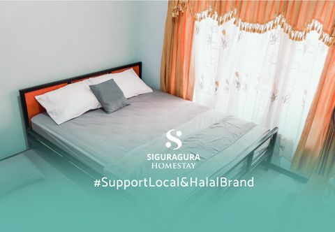 Kamar Tidur Siguragura Homestay Syariah