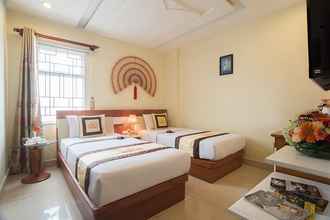 Kamar Tidur 4 Boss Palace Hotel