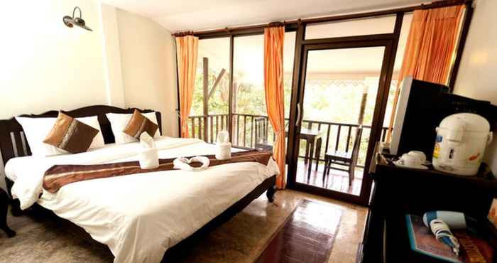 ห้องนอน Chang Cliff Resort