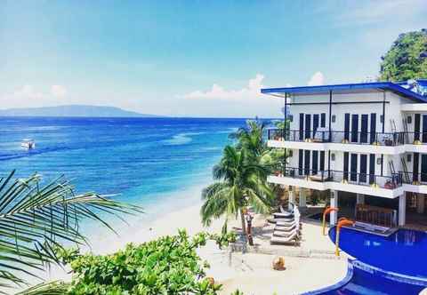 Exterior Sunset at Aninuan Beach Resort