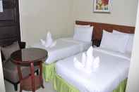 ห้องนอน Naga Pilgrims Hotel