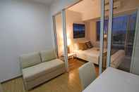 Bedroom SIGLO SUITES @ The Acqua Private Residences