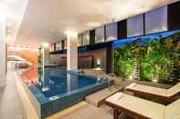 Swimming Pool Beyond Suite Hotel