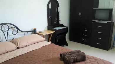 Kamar Tidur 4 Chomhaad Guesthouse