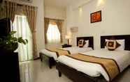 ห้องนอน 4 Green Suites Hotel