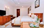 Kamar Tidur 4 Tan Hoang Long Hotel