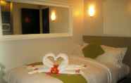 Kamar Tidur 2 Gemtalk Suites Boracay