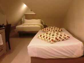 Kamar Tidur 4 Gemtalk Suites Boracay